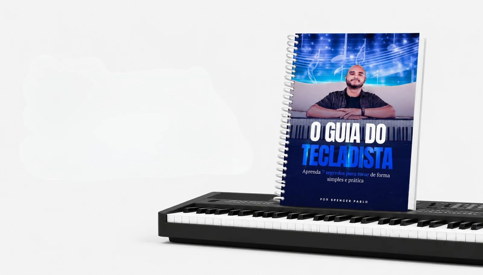 Mockup do Guia do Tecladista sobre um teclado musical